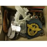 A quantity of Nazi items to inc epaulettes, medal ribbons, cap badges, breast award badge,