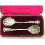 Six HM silver cased spoons;