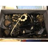 A box of dress jewellery,