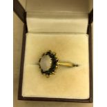 A 9ct gold marcasite and sapphire dressing ring