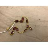 A 14ct garnet rhodolite bracelet