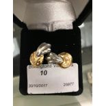 A pair of 18ct bi-gold diamond set earrings