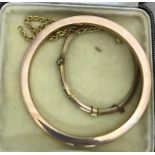 A 9ct gold bangle and bracelet;