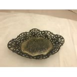 A modern silver pierced dish in antique style