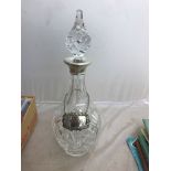 A hallmarked silver rimmed decanter with Sherry label