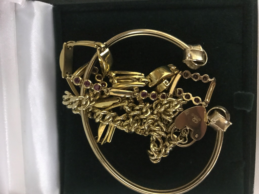 A 9ct gold knot end bangle, a 9ct gold bracelet,