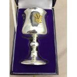 A cased HM silver goblet with gold-plated Prince of Wales ostrich feather motif,
