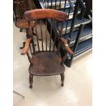 A 19th century mahogany arm chair