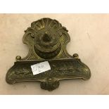 An antique French bronze inkwell and pen stand