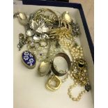 A quantity of dress jewellery; together with a hallmarked silver napkin ring,