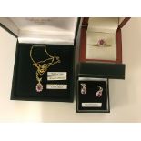 A pink sapphire and diamond necklace set in 18ct gold, a 9ct gold,