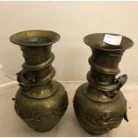 A pair of Oriental bronze vases