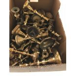 A box of brass candlesticks