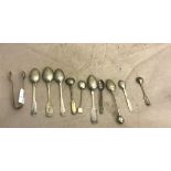 A quantity of HM silver teaspoons and tongs