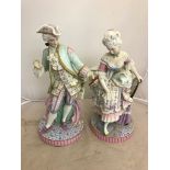 A large pair of bisque Chantilly figures of a man with shoe and woman without