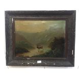 A 19th century oil on canvas depicting a stag in a loch landscape, indistinctly signed lower left,