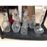 A quantity of decanters to inc one coloured