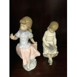 Two Nao figurines of girls