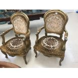 Two French-style open armchairs