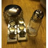 An EPNS sugar sifter and hallmarked silver topped hair tidy;
