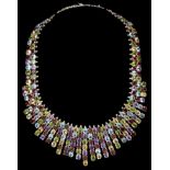 A Silver and Multi-Stone Set Collar Necklace: Blue topaz, peridot, garnet,