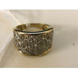 A 9ct diamond set filigree dress ring