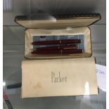 A cased set of three 14k parker pens