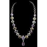 A Silver Citrine and Amethyst Necklace: Set with circular, marquise,