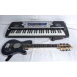 An electric organ and guitar