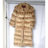 A lady's full length fur coat