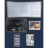 Three framed whisky information posters, a framed distillery print and one other