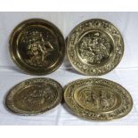 Four brass wall plaques