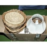 A box containing lamps and baskets