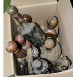 A box containing vintage bottles