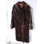 A lady's full length fur coat