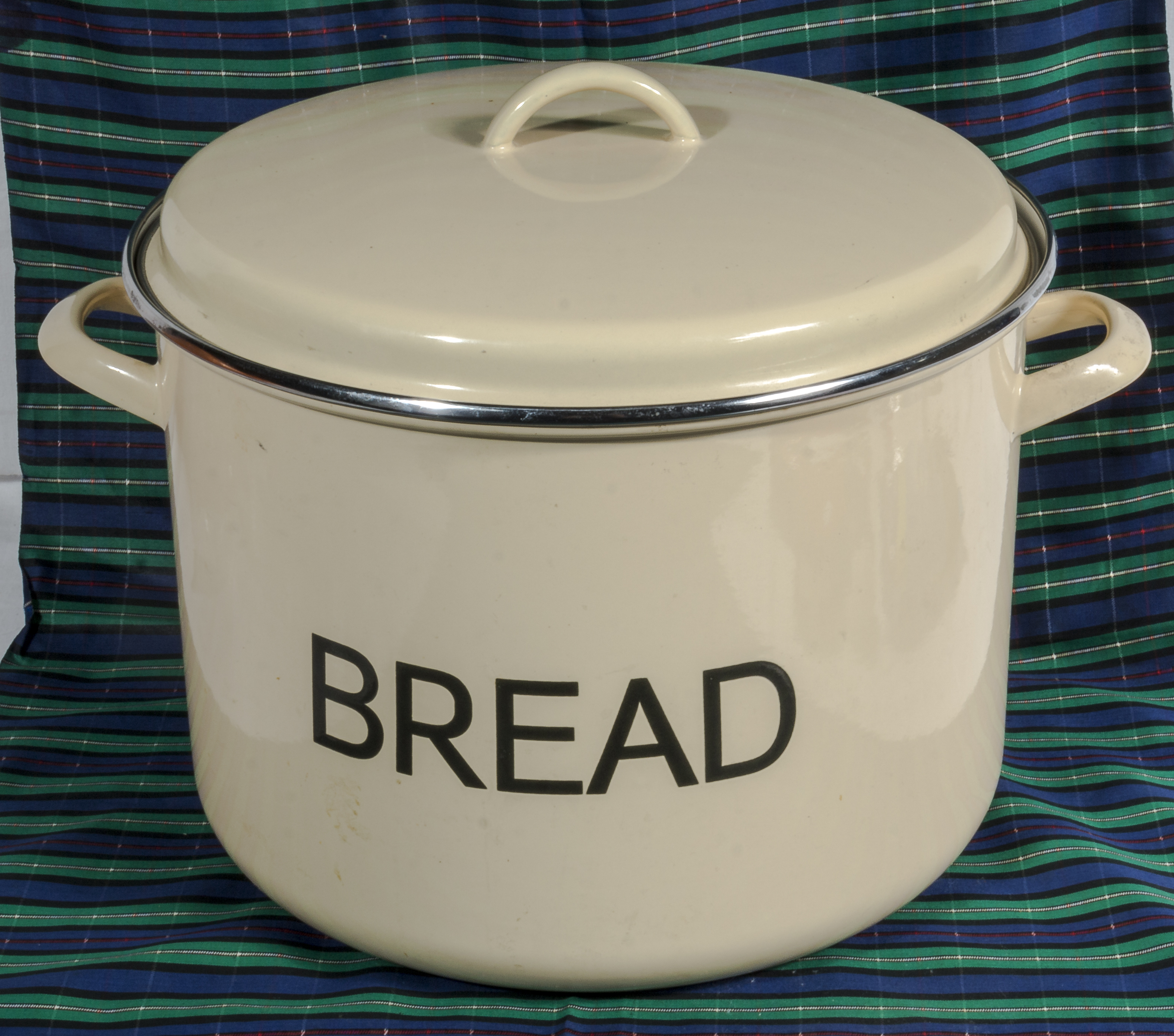 A metal bread bin