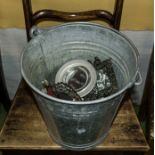 A metal bucket and contents