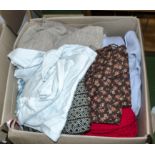 A box containing clothes and linen