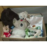 A box containing soft toys and other items