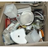 A box containing kitchenware