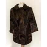 A lady's full length fur coat