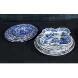 A collection of blue and white transfer printed plates