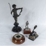 A spelter figure, small barometer, stamp and one other