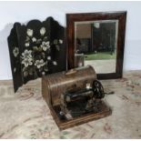 A singer sewing machine, papier mache fire screen and a mirror