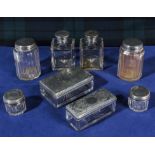 Eight silver topped etched glass dressing table jars and boxes