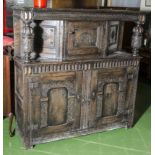 A period oak court cupboard of cottage size