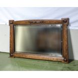 An oak framed Arts & Crafts mirror