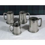 Four pewter tankards