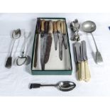 A collection of bone handled knives and other cutlery