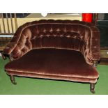 A late Victorian upholstered two seater couch